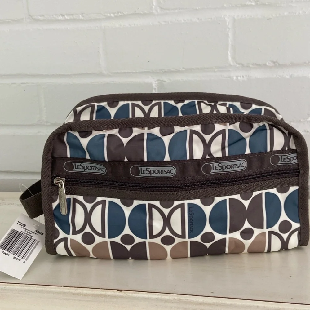 New With Tags LeSportsac Blue/Brown Patterned Cosmetic Travel Overnight Pouch